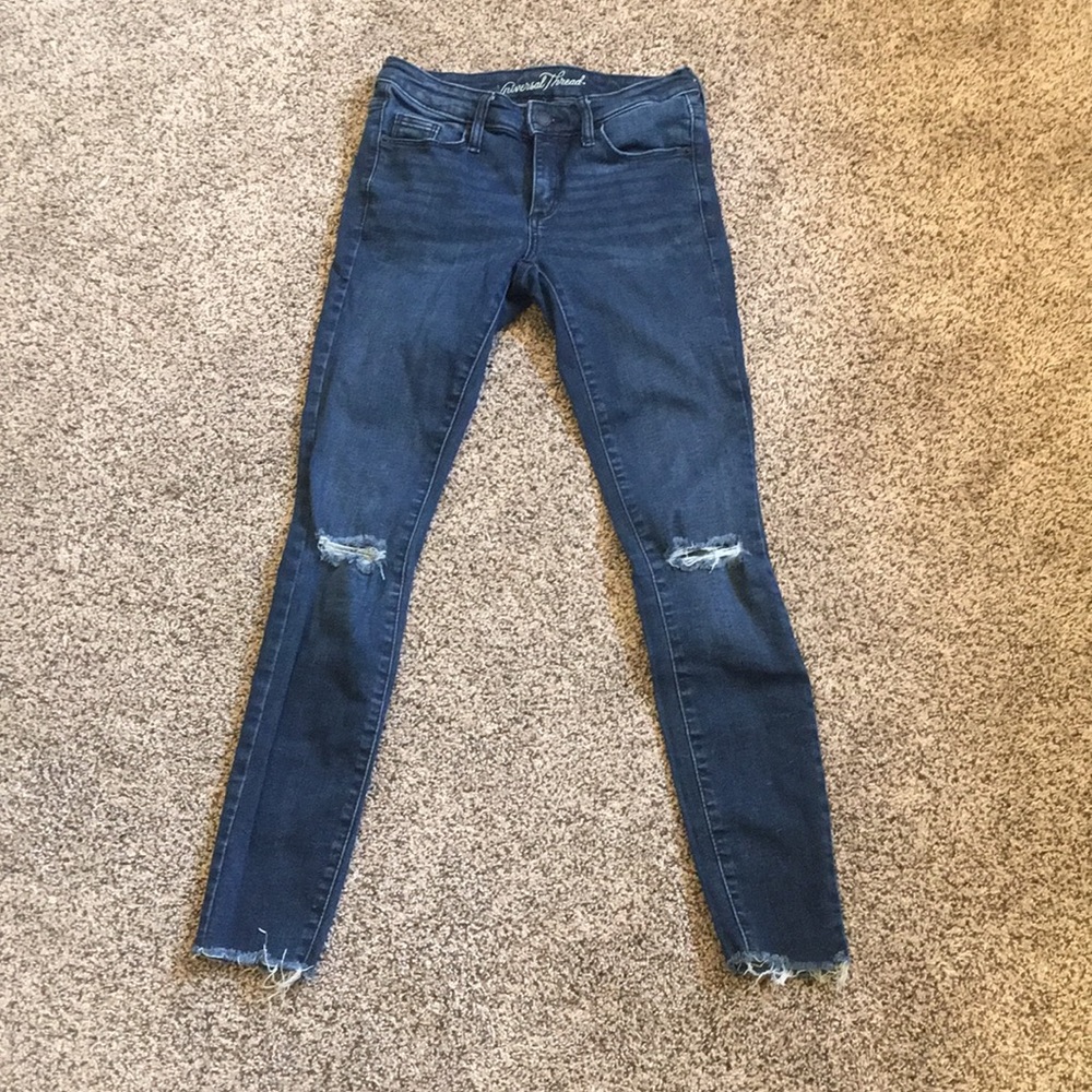 Dark blue ripped jeans